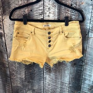Billabong yellow cut off shorts 28